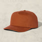 Brown cap on a beige background