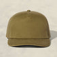Olive green baseball cap on a beige background