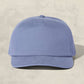 Blue baseball cap on a beige background
