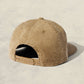 Beige cap on a light beige background