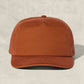 Brown cap on a beige background