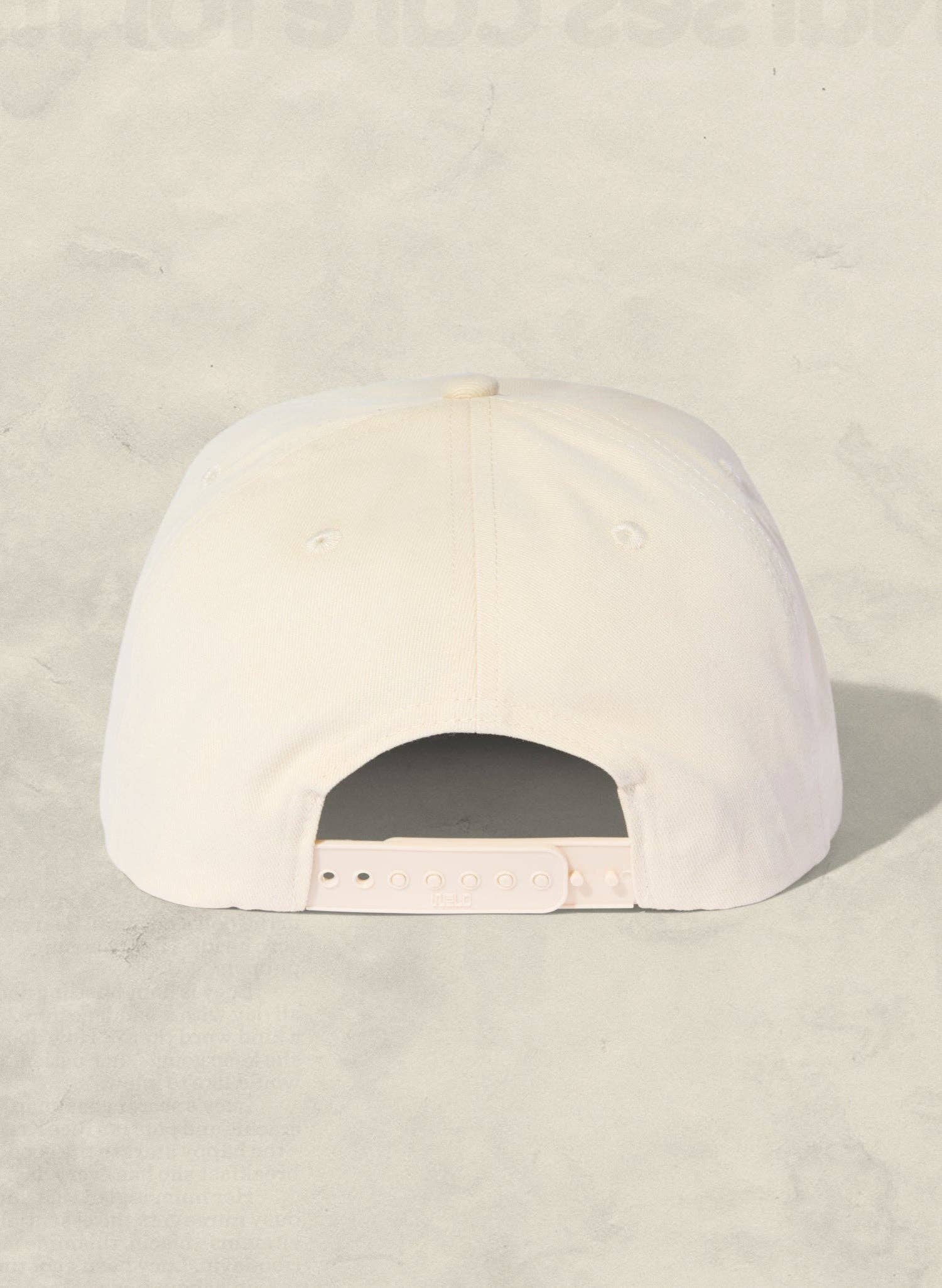 White cap on a light beige background