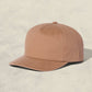 Brown cap on a beige background